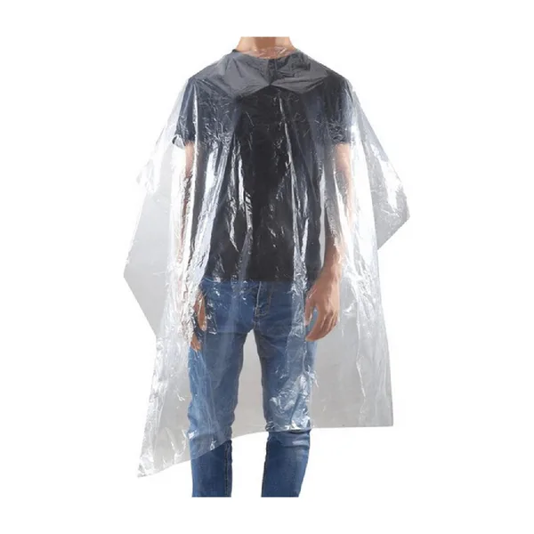 A clear disposable cape worn by a model